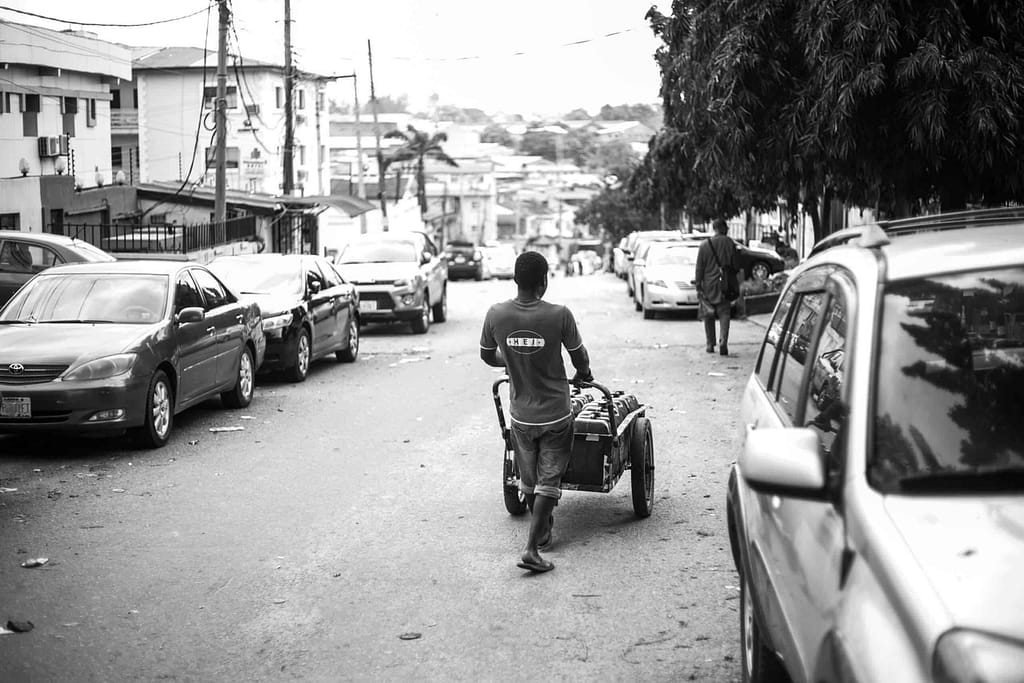 Water distributor on his way to sell water in Lagos Nigeria